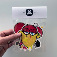 hand holding an Ayecon various sticker pack set with four stickers